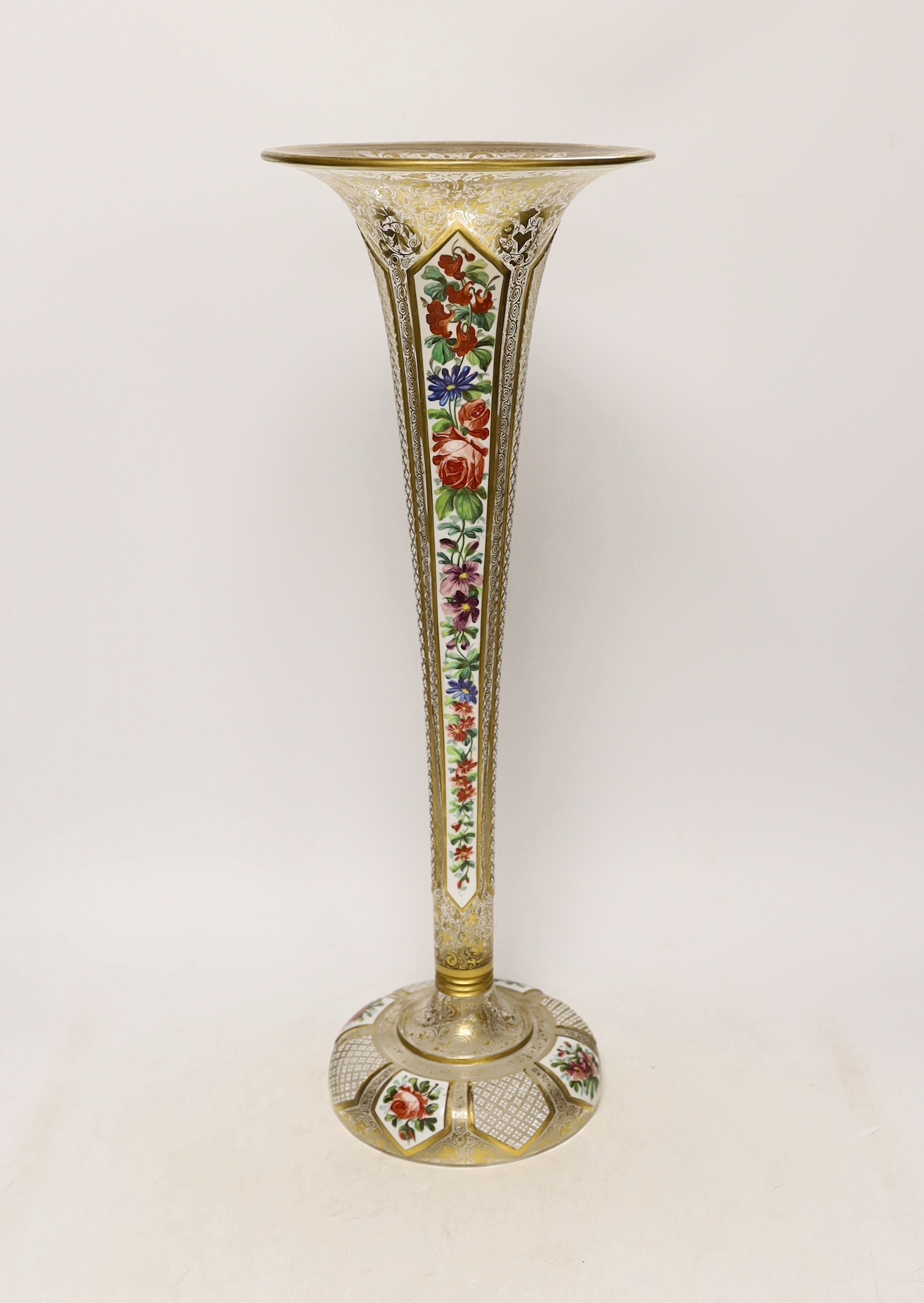 A large late 19th century Bohemian gilt and enamelled glass trumpet shaped vase, 50cm